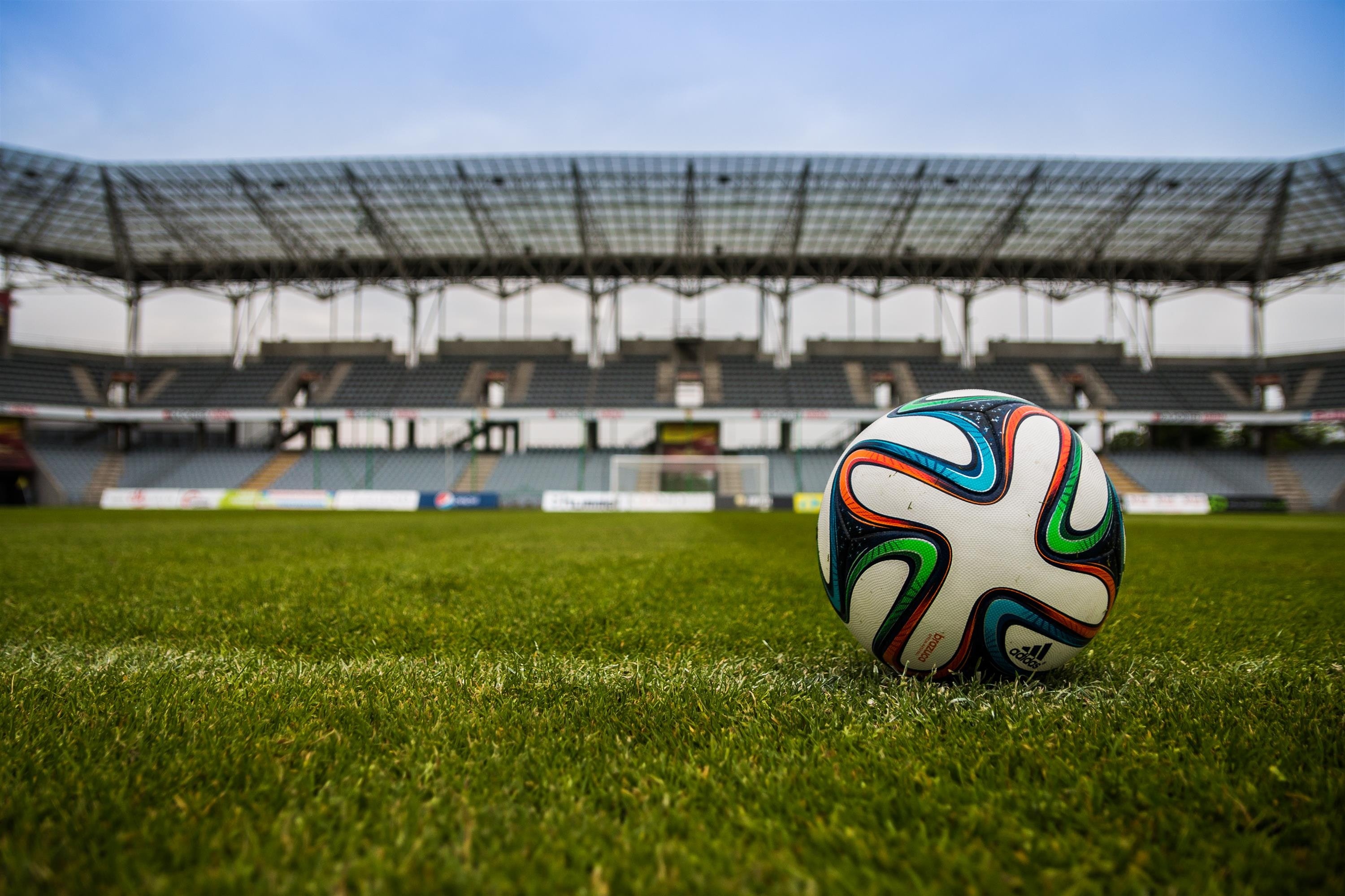 soccer ball on grass field during daytime 46798
